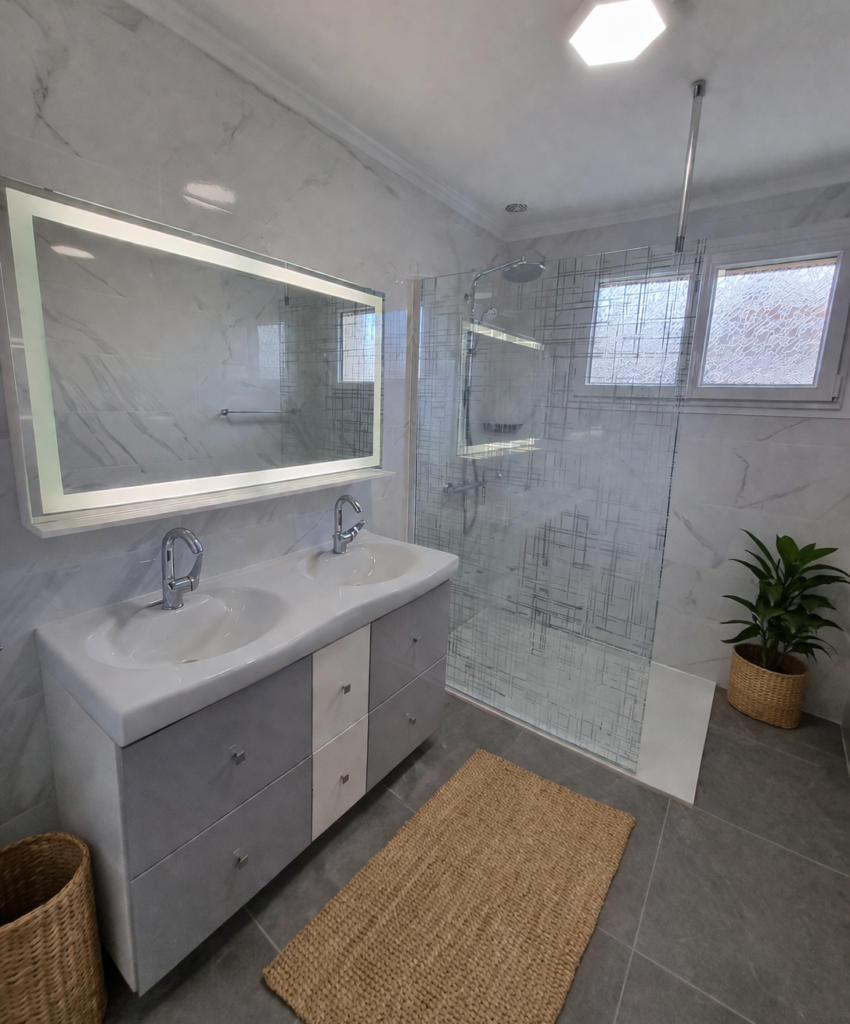 Rénovation salle de bains à Saint-Martin-Lestra : transformation complète avec douche moderne